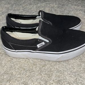 Black high top slip on vans